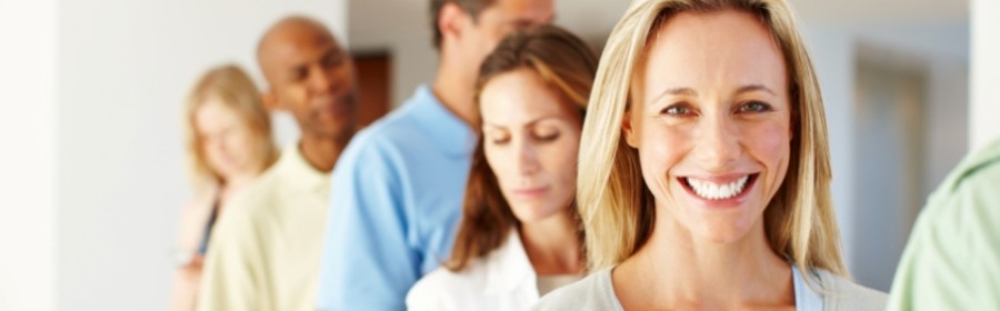 Business woman with associates in a row